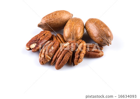 Few pecan nuts isolated on white Few pecan nuts isolated on white 16634093