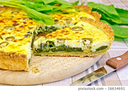 Pie with spinach on the tablecloth Pie with spinach on the tablecloth 16634691