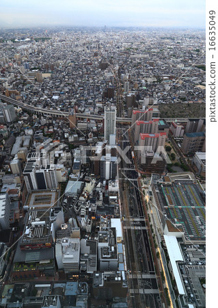 Osaka 's fence at dawn seen from Abeno Harkus and Hanshin Express No. 14 Matsubara Line, Nagai Track and Field Osaka 's fence at dawn seen from Abeno Harkus and Hanshin Express No. 14 Matsubara Line, Nagai Track and Field 16635049