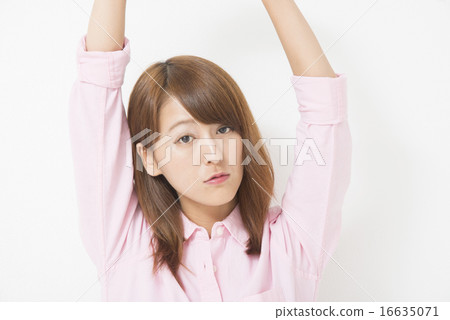 Businesswoman stretching Businesswoman stretching 16635071