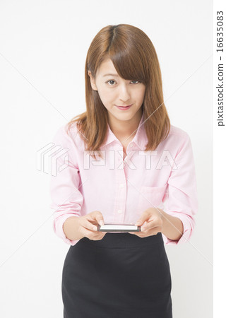 Business woman handing business cards Business woman handing business cards 16635083