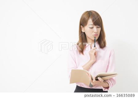 Business woman with notebook Business woman with notebook 16635089