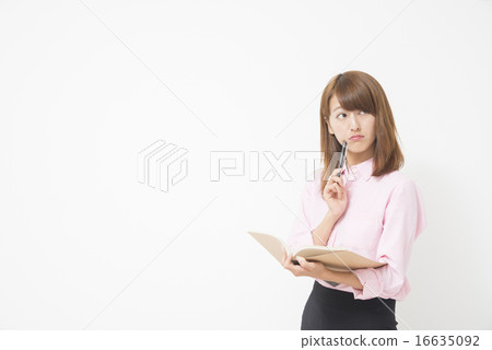 Business woman with notebook 16635092