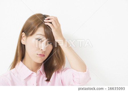 Business woman putting hands on her head 16635093
