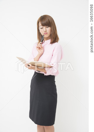 Business woman with notebook Business woman with notebook 16635098