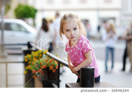 Adorable little girl portrait outdoors 16646264