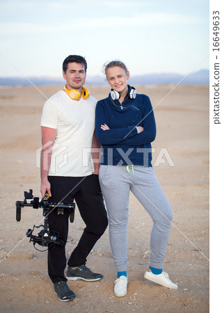 Young people with steadycam on the beach Young people with steadycam on the beach 16649633