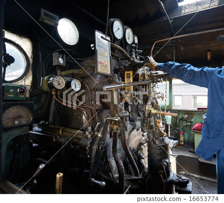 Steam locomotive operator's room preparing to departure 16653774