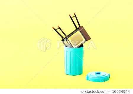 A cathode ray tube TV discarded in the garbage can A cathode ray tube TV discarded in the garbage can 16654944