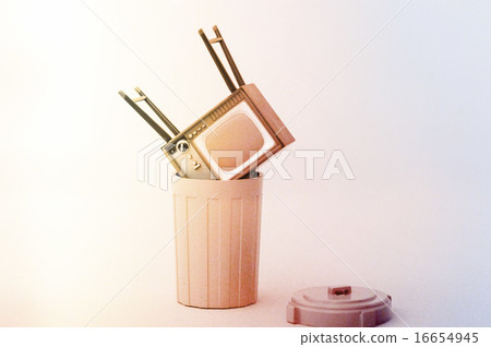 A cathode ray tube TV discarded in the garbage can 16654945