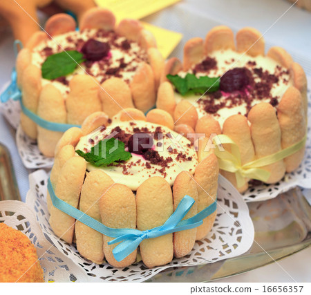 savoiardi cake topped with cherry 16656357