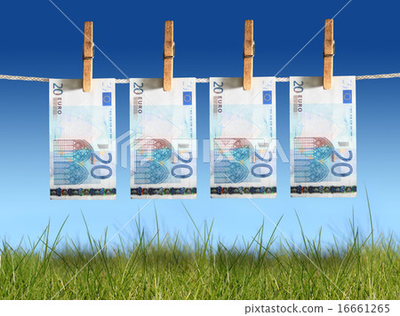 Banknotes hanging on laundry line. 16661265
