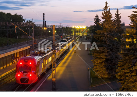 Train on railway station at night Train on railway station at night 16662463