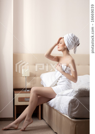 Lovely woman resting after taking bath 16669039