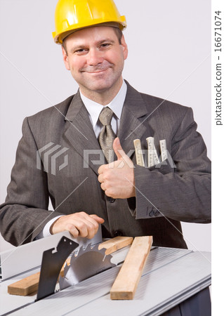businessman and circular saw 16671074