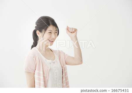A woman doing a guts pose A woman doing a guts pose 16675431