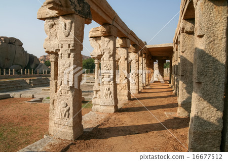 Pillars of ruined temple in hampi 16677512