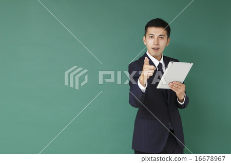 Male instructor with tablet Male instructor with tablet 16678967