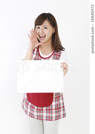 A nursery teacher showing a white board 16680472