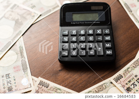 Calculator and 10,000 yen bill 16684583