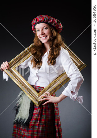 Scottish woman with frame on white 16684956