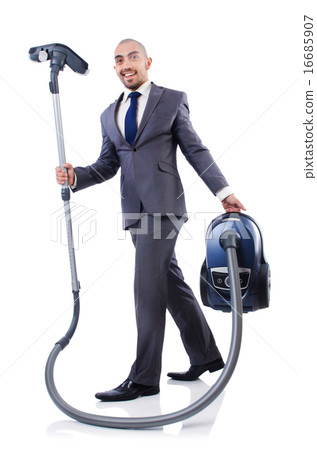 Businessman doing vacuum cleaning on white 16685907