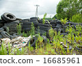 Illegal dumping of waste tires 16685961