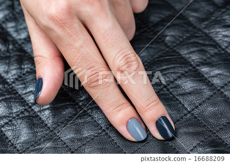 Women's hands with a stylish manicure. Women's hands with a stylish manicure. 16688209