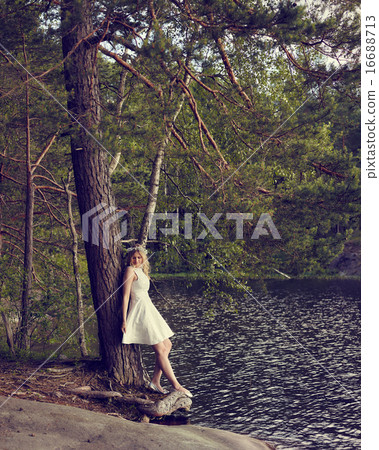 Attractive woman on the lake Attractive woman on the lake 16688713