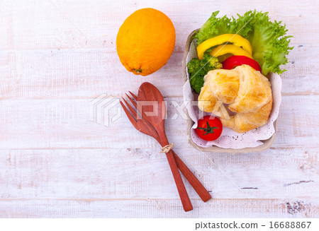 Clean food breakfast croissant and salad . Clean food breakfast croissant and salad . 16688867