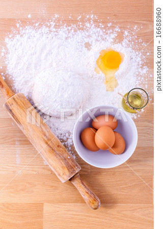 Baking ingredients including fresh eggs. Baking ingredients including fresh eggs. 16688960