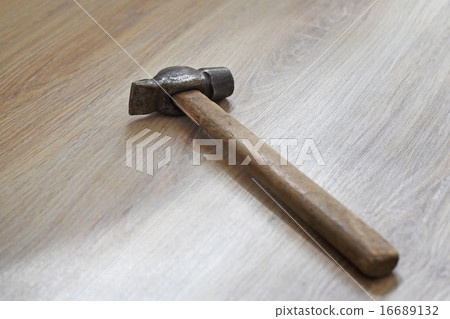 hammer on the wooden floor hammer on the wooden floor 16689132