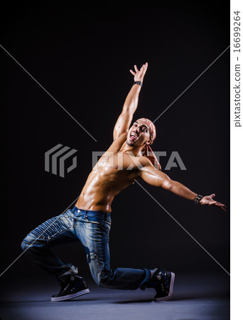 Dancer dancing in the dark studio Dancer dancing in the dark studio 16699264