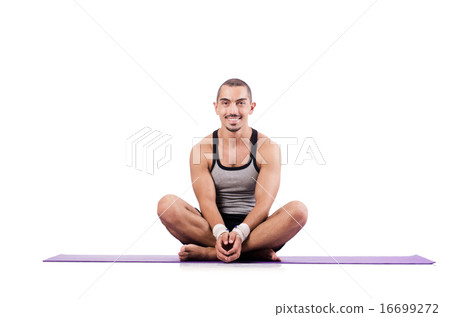 Man doing exercises on white 16699272
