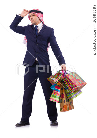 Arab man with shopping gifts on white Arab man with shopping gifts on white 16699595