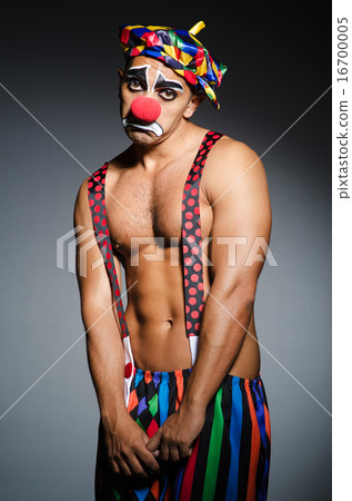 Sad clown against dark background 16700005