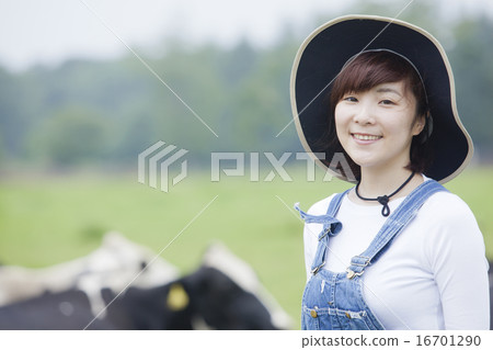 A woman working in a farm 16701290