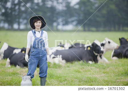 A woman working in a farm A woman working in a farm 16701302
