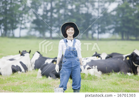 A woman working in a farm A woman working in a farm 16701303