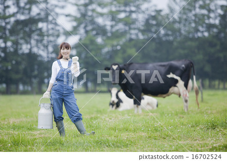 A woman working in a farm A woman working in a farm 16702524