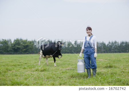 A woman working in a farm 16702742