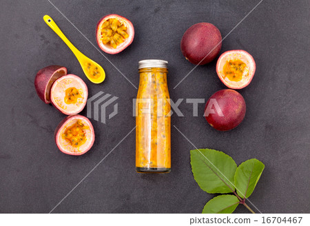 Fresh passion fruit and juice in the bottle. Fresh passion fruit and juice in the bottle. 16704467