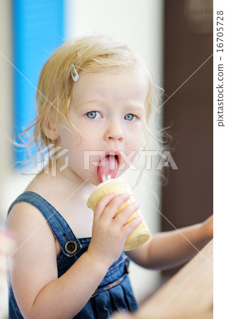 Toddler girl eating ice cream Toddler girl eating ice cream 16705728