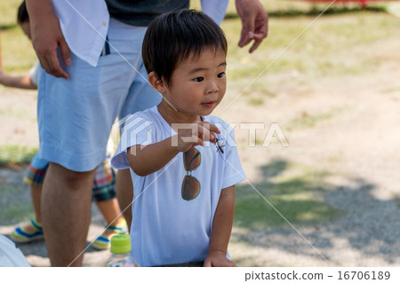 Infants playing in the park 16706189