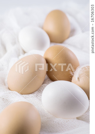 Brown and white eggs on cloth country style Brown and white eggs on cloth country style 16706303