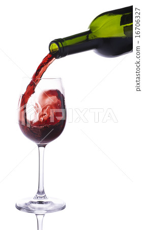 Red wine pouring into small wineglass Red wine pouring into small wineglass 16706327