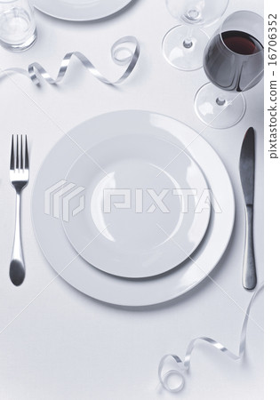 Festive christmas table set with red wine 16706352