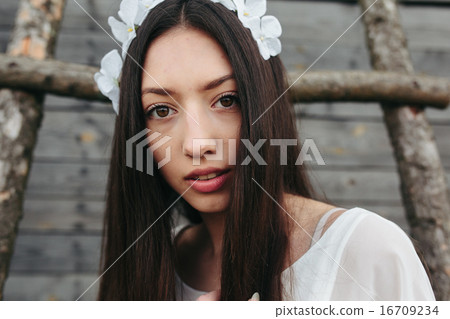 Girl climbing ladder into tree house Girl climbing ladder into tree house 16709234