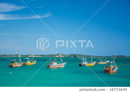 Fishing boat in beautiful ocean 16715649