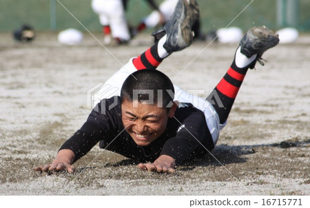A baseball boy covered in mud A baseball boy covered in mud 16715771